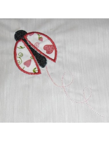 Motif de broderie  cocinelle