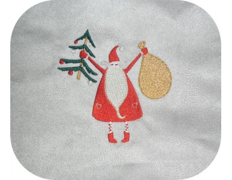 Motif de broderie machine Père Noël avec son sapin