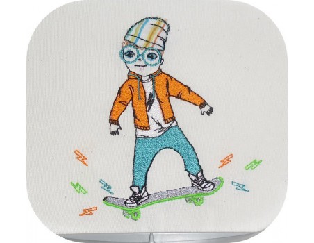 Motif de broderie machine garçon avec son skate