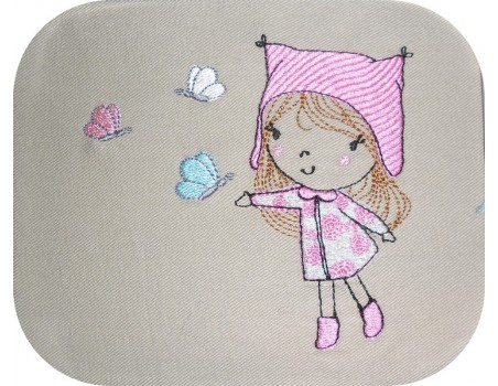 Motif de broderie machine petite fille aux papillons