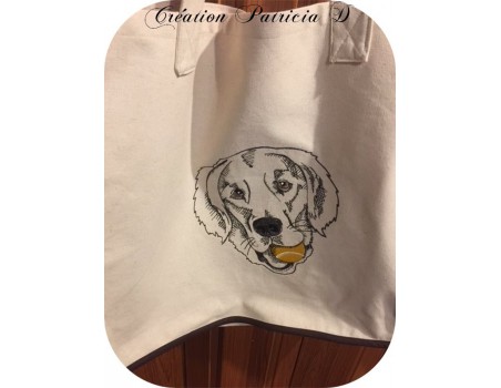 Motif de broderie machine labrador avec sa balle de tennis