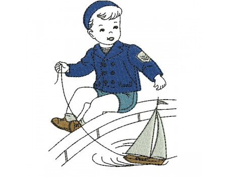 Motif de broderie machine garçon avec son bateau