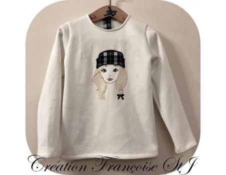 Motif de broderie machine fille avec son bonnet en mylar