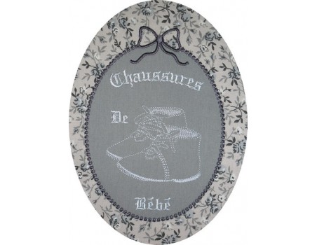 motif de broderie chaussures bébé dans cadre