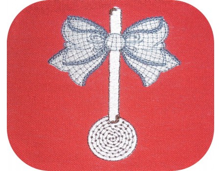 Motif de broderie machine écumoir  emaillé avec un noeud