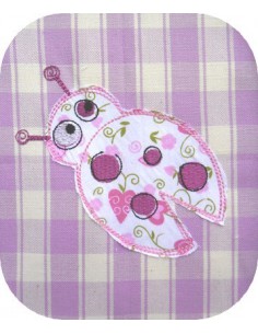 Motif de broderie coccinelle appliquée