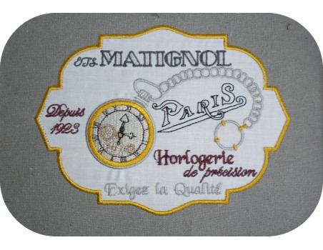 Motif de broderie plaque publicitaire horlogerie