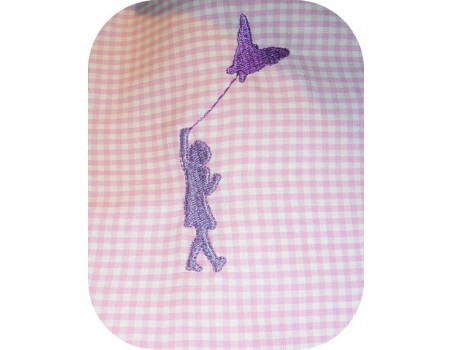 Motif de broderie fille au cerf volant