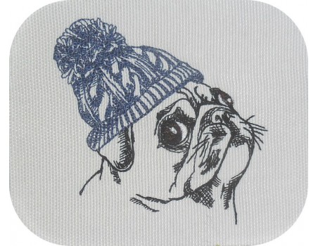 Motif de broderie machine carlin avec son bonnet en laine