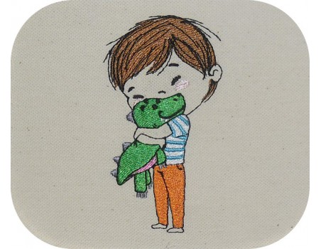 Motif de broderie machine garçon  avec son doudou dinosaure