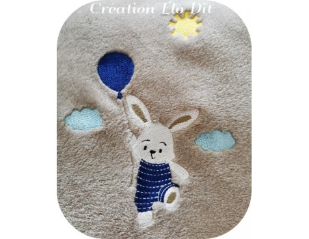 Motif de broderie machine  lapin avec son ballon