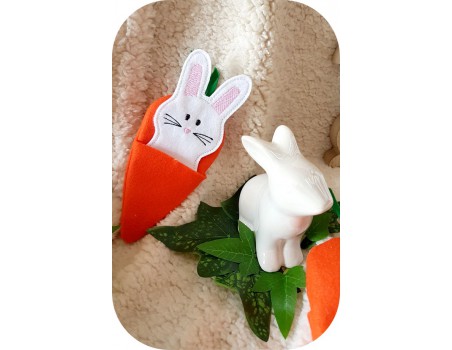 machine embroidery design ith rabbit in his carrot