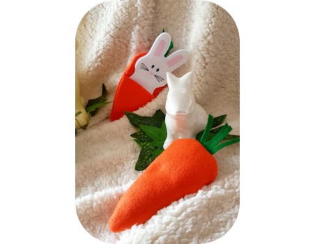 machine embroidery design ith rabbit in his carrot