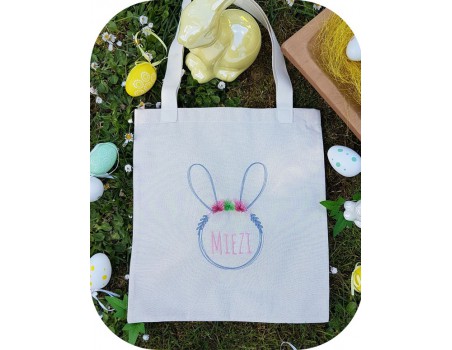 Motif de broderie machine  lapin personnalisable avec ses  fleurs et pompons en 3D