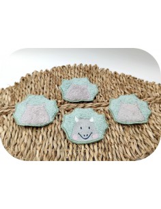 machine embroidery design ith reusable dinosaur head cotton wipes