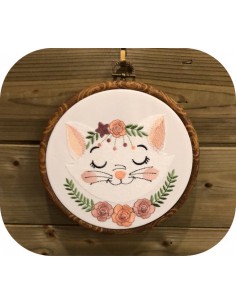machine embroidery design sleeping cat with  flowers