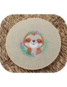Motif de broderie machine paresseux fleurs endormie