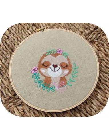 machine embroidery design sleeping sloth with  flowers