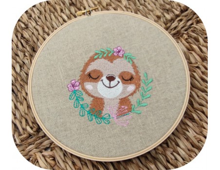 machine embroidery design sleeping sloth with  flowers