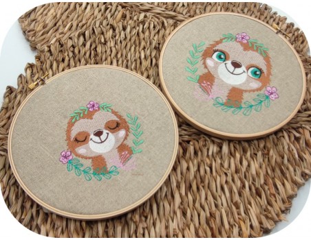 machine embroidery design sleeping sloth with  flowers