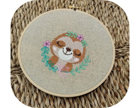 machine embroidery design sleeping sloth with  flowers