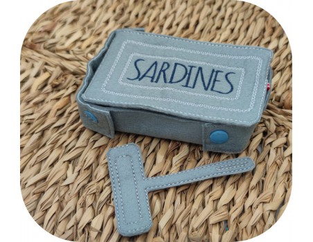 machine embroidery design ith tin of sardines