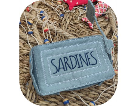 machine embroidery design ith tin of sardines