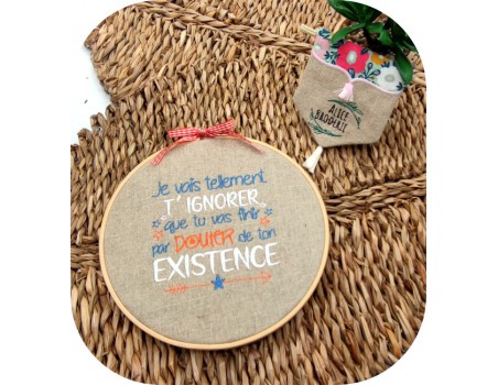 Motif de broderie machine texte  existence