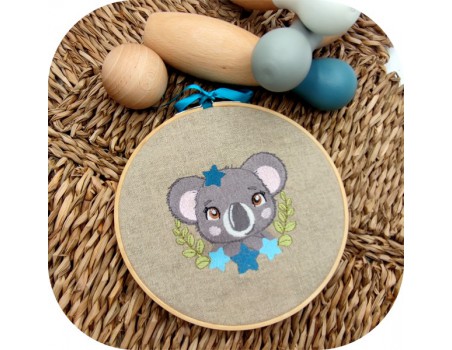 Motif de broderie machine koala étoiles