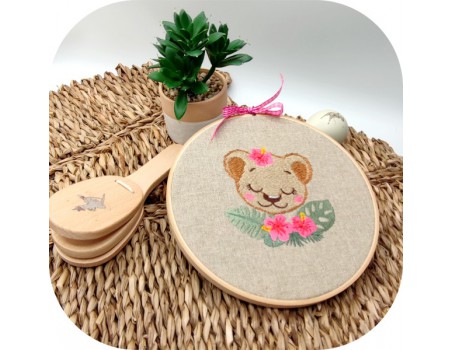 machine embroidery design sleeping  lion  with flowers