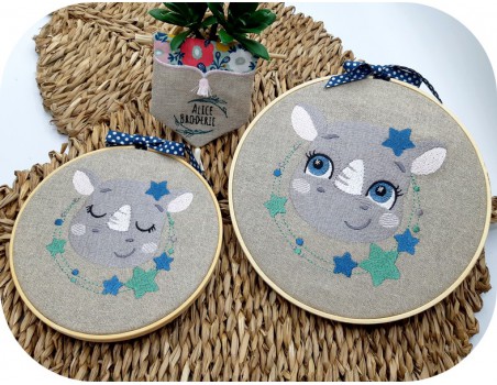 Motif de broderie machine rhinocéros endormi  avec ses étoiles