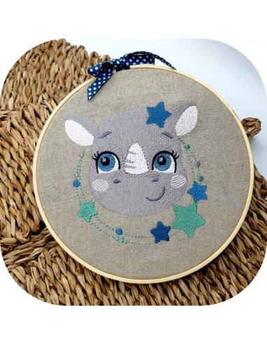 Motif de broderie machine rhinocéros avec ses étoiles