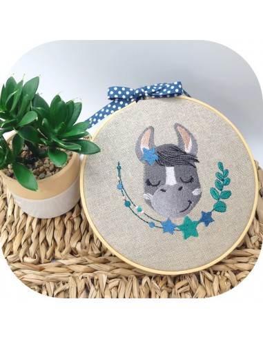 machine embroidery design  sleeping donkey with star