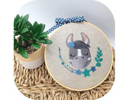 machine embroidery design  sleeping donkey with star