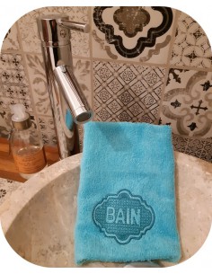 Motif de broderie machine  texte  bain en embossage