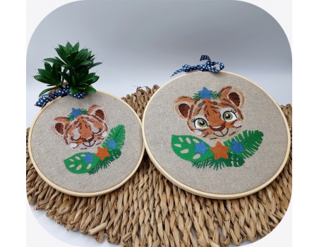 Motif de broderie machine tigre avec ses étoiles