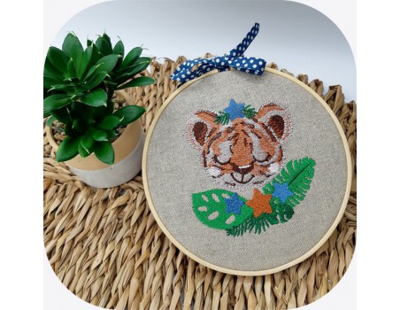 machine embroidery design sleeping tiger with star