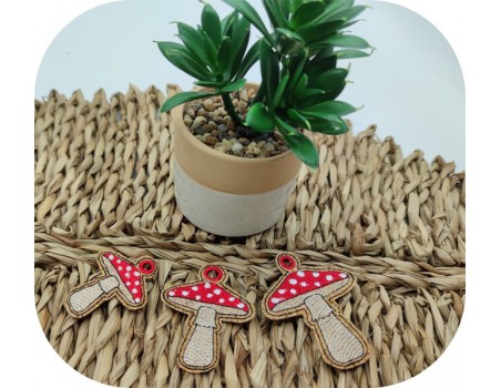 machine embroidery ith  red mushrooms keychain