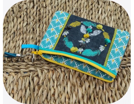 machine embroidery  design ith pencil case boho and feathers