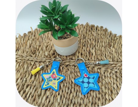 machine embroidery  design ith  key ring applique star