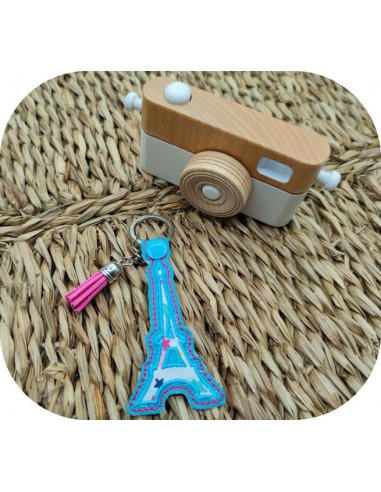 machine embroidery  design ith  key ring applique Eiffel Tower