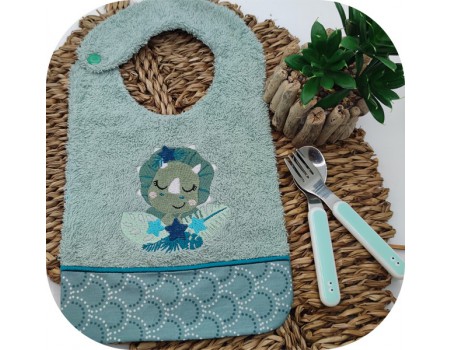 Motif de broderie machine dinosaure triceratops endormi