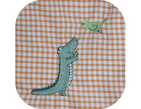 Motif de broderie machine crocodile et l'oiseau