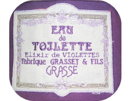 Motif de broderie machine cadre fleurs publicité eau de toilette