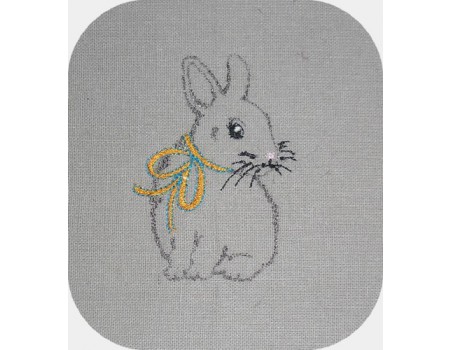 Motif de broderie machine petit lapin avec un noeud