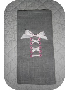 Motif de broderie machine oeillets pour ruban à lacer