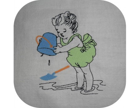 Motif de broderie machine petite fille à la plage avec son seau